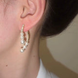 Silver needle crossed pearl diamond earrings women's exquisite light luxury high-end stud earrings niche design temperament versatile earrings