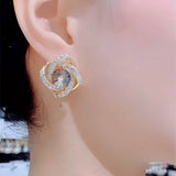 Gray zircon winding earrings, feminine temperament, light luxury, high-end silver needle earrings, popular Popular style ear jewelry in