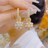 Temperament high sense full of diamonds pearl ball earrings  celebrity light luxury earrings women's diamond silver needle stud earrings new