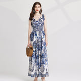 Real shot, sexy V-neck positioning printed rubber band high-waisted dress, bow strap skirt is thin and versatile.