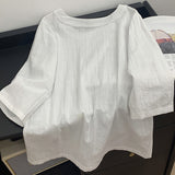 The relaxation of cotton and linen, the round neck seven-quarter sleeve shirt for women's  spring and summer new Korean version of solid color simple temperament top
