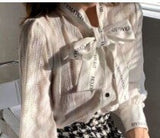 hulianfu French style restoring ancient ways ribbon bow blouse female temperament of early spring new white shirt long sleeve lace tops